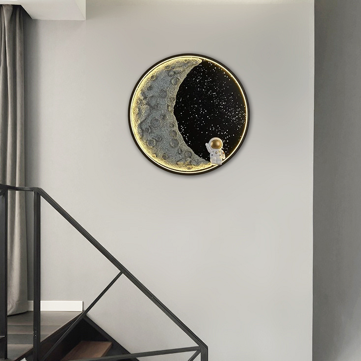 Kids room lighting guide featuring a glowing moon wall art with an astronaut for a fun decor.