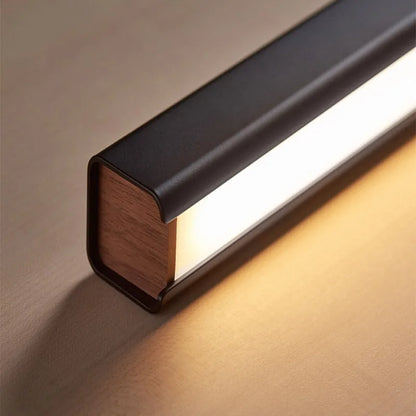 Minimalist Black Linear Pendant Light Wood-Grain End Detail